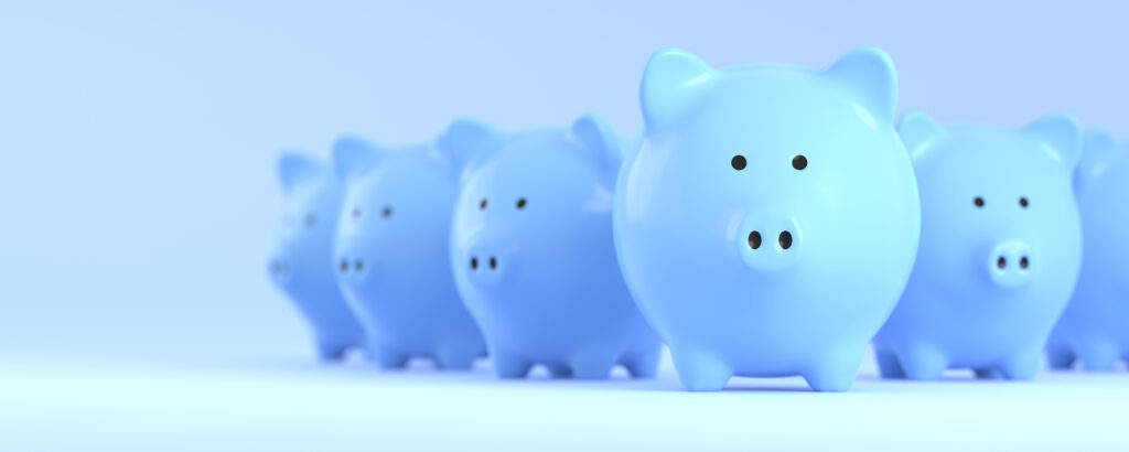 several,3d,blue,piggy,bank,on,a,blue,background